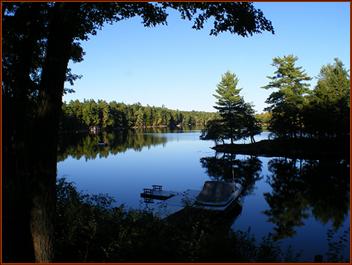 Serenity: glass-calm waters at dusk, late summer
