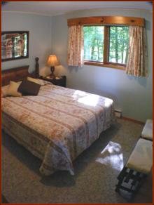 Fourth bedroom on main floor could be re-configured as an office, den, etc. Shown here with queen bed.