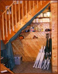 Drape is raised with tie-backs, areas used as storage.
