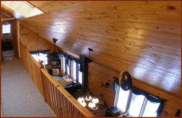 Looking down on the Great Room from the loft/balcony.