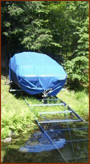 Marine railway with boat, (winter cover)